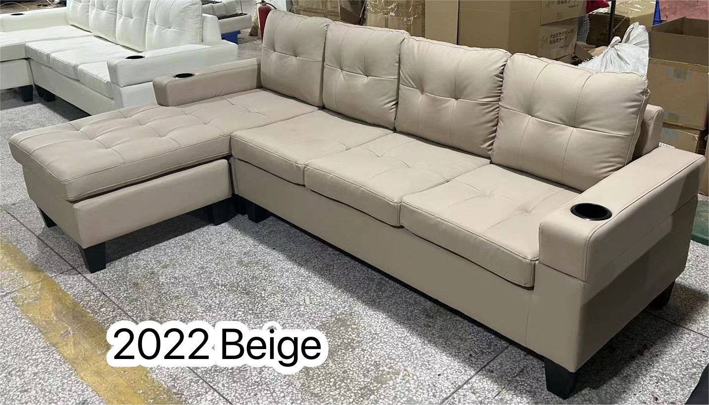 ANTI SCRATCH LEATHER UPHOLSTERED SECTIONAL SOFA WITH REVERSIBLE CHAISE AND CUPHOLDERS- BEIGE