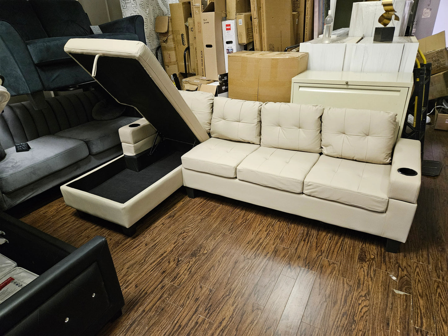 ANTI SCRATCH LEATHER UPHOLSTERED SECTIONAL SOFA WITH STORAGE CHAISE AND CUPHOLDERS- BEIGE